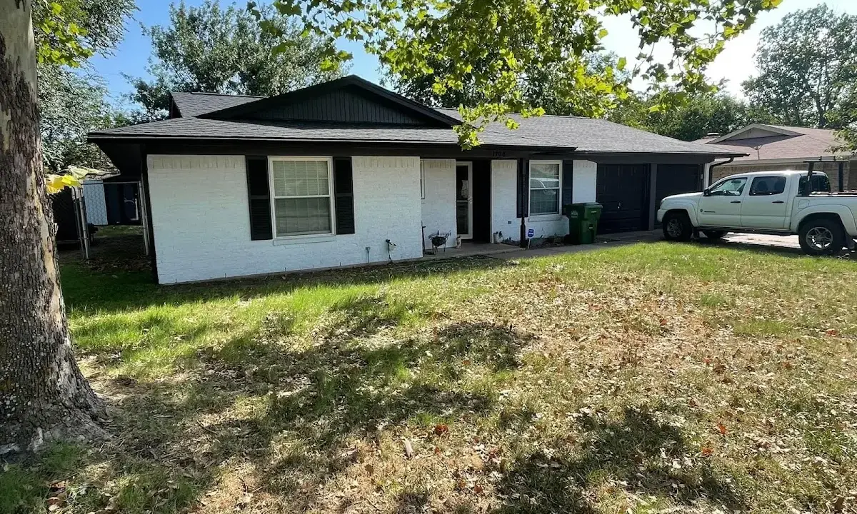 Professional roofing crew working on a residential roof in Canal Fulton
